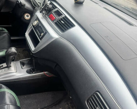 Чорний Міцубісі Lancer, об'ємом двигуна 2 л та пробігом 210 тис. км за 5500 $, фото 28 на Automoto.ua