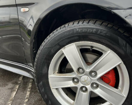 Черный Мицубиси Лансер, объемом двигателя 2 л и пробегом 350 тыс. км за 6700 $, фото 7 на Automoto.ua