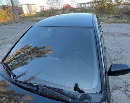 Черный Мицубиси Лансер, объемом двигателя 2 л и пробегом 280 тыс. км за 5400 $, фото 7 на Automoto.ua