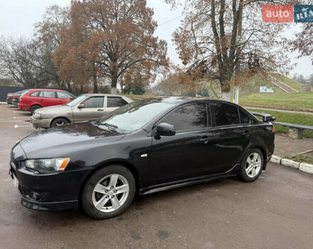 Чорний Міцубісі Lancer, об'ємом двигуна 2 л та пробігом 281 тис. км за 6000 $, фото 2 на Automoto.ua