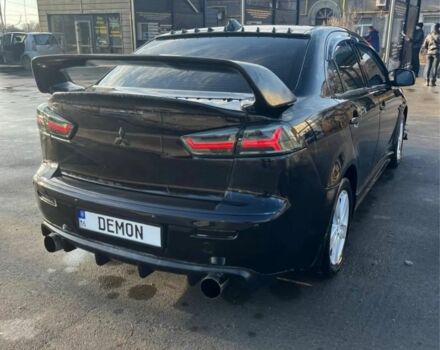Чорний Міцубісі Lancer, об'ємом двигуна 2 л та пробігом 226 тис. км за 6700 $, фото 1 на Automoto.ua