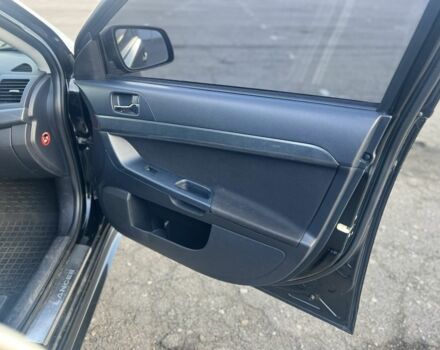 Черный Мицубиси Лансер, объемом двигателя 2 л и пробегом 170 тыс. км за 7900 $, фото 14 на Automoto.ua