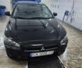 Черный Мицубиси Лансер, объемом двигателя 1.5 л и пробегом 170 тыс. км за 5800 $, фото 1 на Automoto.ua