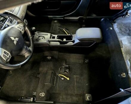 Чорний Міцубісі Lancer, об'ємом двигуна 2 л та пробігом 260 тис. км за 6555 $, фото 46 на Automoto.ua