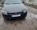 Черный Мицубиси Лансер, объемом двигателя 2 л и пробегом 215 тыс. км за 5700 $, фото 1 на Automoto.ua