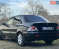 Чорний Міцубісі Lancer, об'ємом двигуна 1.58 л та пробігом 185 тис. км за 3750 $, фото 3 на Automoto.ua