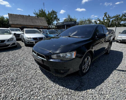 Чорний Міцубісі Lancer, об'ємом двигуна 2 л та пробігом 253 тис. км за 6400 $, фото 7 на Automoto.ua