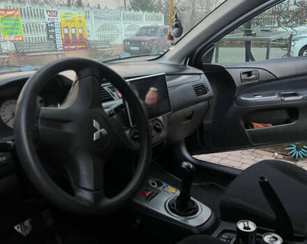 Черный Мицубиси Лансер, объемом двигателя 1.6 л и пробегом 180 тыс. км за 3499 $, фото 14 на Automoto.ua