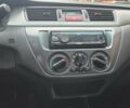 Мицубиси Лансер 2007 в Кривом Роге на Automoto.ua Черный Мицубиси Лансер, объемом двигателя 1.6 л и пробегом 200 тыс. км за 4900 $, фото 12 на Automoto.ua