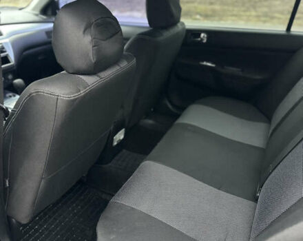 Черный Мицубиси Лансер, объемом двигателя 2 л и пробегом 260 тыс. км за 5300 $, фото 11 на Automoto.ua