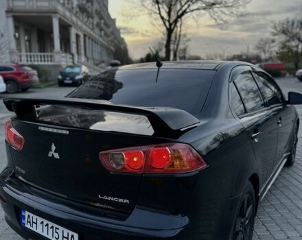 Черный Мицубиси Лансер, объемом двигателя 2 л и пробегом 242 тыс. км за 6200 $, фото 11 на Automoto.ua