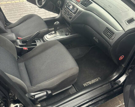 Чорний Міцубісі Lancer, об'ємом двигуна 1.6 л та пробігом 270 тис. км за 4500 $, фото 4 на Automoto.ua