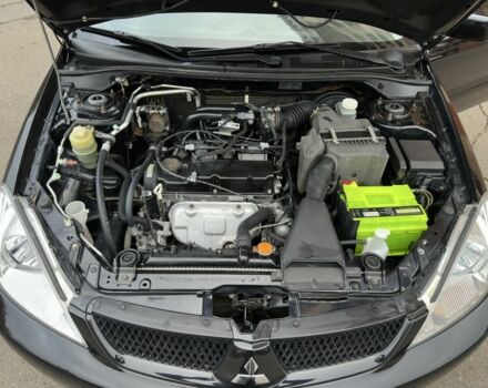 Черный Мицубиси Лансер, объемом двигателя 1.6 л и пробегом 173 тыс. км за 4700 $, фото 18 на Automoto.ua