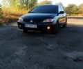 Чорний Міцубісі Lancer, об'ємом двигуна 1.6 л та пробігом 178 тис. км за 4250 $, фото 1 на Automoto.ua