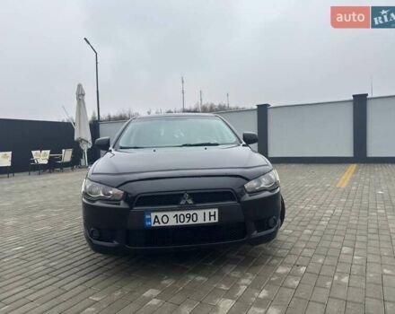 Черный Мицубиси Лансер, объемом двигателя 2 л и пробегом 259 тыс. км за 6500 $, фото 5 на Automoto.ua