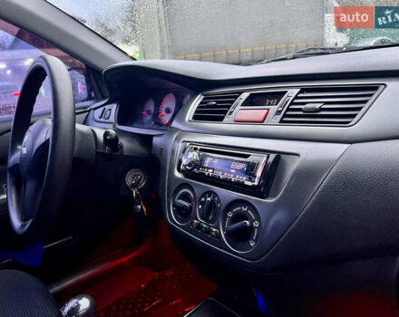 Чорний Міцубісі Lancer, об'ємом двигуна 1.6 л та пробігом 303 тис. км за 4350 $, фото 25 на Automoto.ua