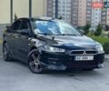 Черный Мицубиси Лансер, объемом двигателя 2 л и пробегом 269 тыс. км за 6150 $, фото 1 на Automoto.ua