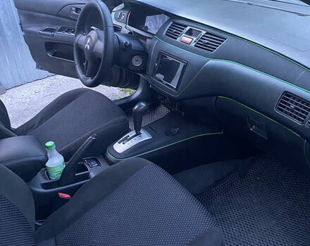 Чорний Міцубісі Lancer, об'ємом двигуна 1.6 л та пробігом 195 тис. км за 5200 $, фото 25 на Automoto.ua