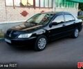 Черный Мицубиси Лансер, объемом двигателя 1.6 л и пробегом 170 тыс. км за 3500 $, фото 1 на Automoto.ua