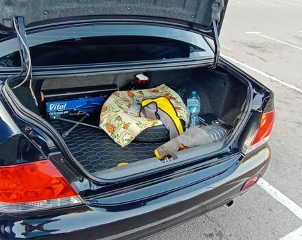 Черный Мицубиси Лансер, объемом двигателя 1.6 л и пробегом 301 тыс. км за 4300 $, фото 8 на Automoto.ua