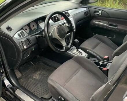 Чорний Міцубісі Lancer, об'ємом двигуна 2 л та пробігом 258 тис. км за 5200 $, фото 3 на Automoto.ua