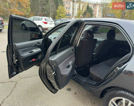 Чорний Міцубісі Lancer, об'ємом двигуна 1.58 л та пробігом 173 тис. км за 4700 $, фото 10 на Automoto.ua