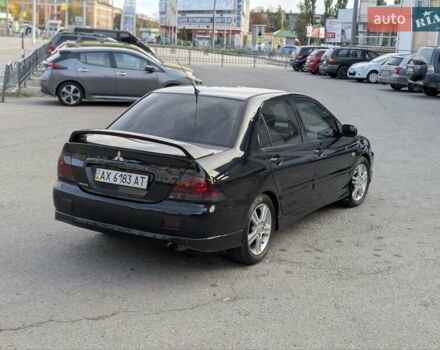 Чорний Міцубісі Lancer, об'ємом двигуна 2 л та пробігом 152 тис. км за 5500 $, фото 5 на Automoto.ua