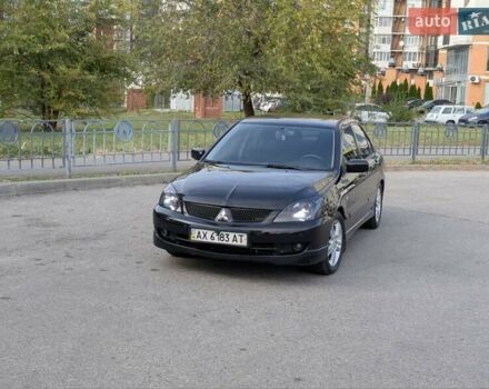 Чорний Міцубісі Lancer, об'ємом двигуна 2 л та пробігом 152 тис. км за 5500 $, фото 9 на Automoto.ua