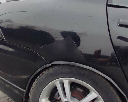 Чорний Міцубісі Lancer, об'ємом двигуна 2 л та пробігом 145 тис. км за 5000 $, фото 14 на Automoto.ua