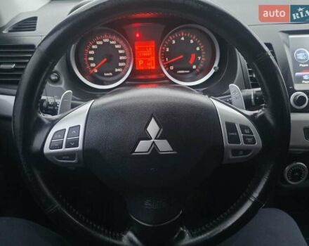 Черный Мицубиси Лансер, объемом двигателя 2 л и пробегом 116 тыс. км за 7200 $, фото 7 на Automoto.ua