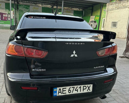 Чорний Міцубісі Lancer, об'ємом двигуна 2 л та пробігом 256 тис. км за 5500 $, фото 14 на Automoto.ua