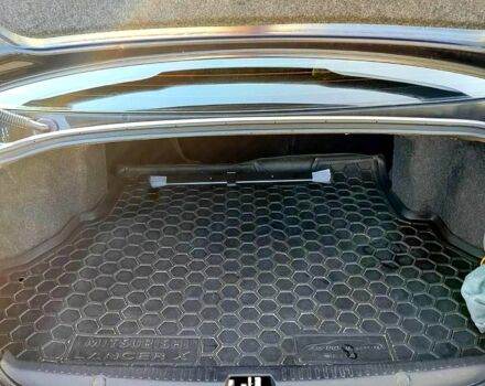 Черный Мицубиси Лансер, объемом двигателя 1.5 л и пробегом 215 тыс. км за 5600 $, фото 10 на Automoto.ua