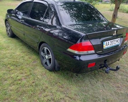 Чорний Міцубісі Lancer, об'ємом двигуна 1.6 л та пробігом 210 тис. км за 5500 $, фото 7 на Automoto.ua