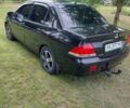 Чорний Міцубісі Lancer, об'ємом двигуна 1.6 л та пробігом 210 тис. км за 5500 $, фото 7 на Automoto.ua