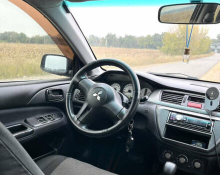 Чорний Міцубісі Lancer, об'ємом двигуна 1.6 л та пробігом 212 тис. км за 4700 $, фото 7 на Automoto.ua