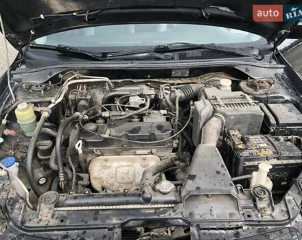 Чорний Міцубісі Lancer, об'ємом двигуна 1.59 л та пробігом 179 тис. км за 4980 $, фото 8 на Automoto.ua