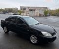Черный Мицубиси Лансер, объемом двигателя 1.6 л и пробегом 200 тыс. км за 4150 $, фото 1 на Automoto.ua