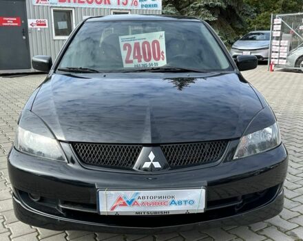 Мицубиси Лансер 2007 в Кривом Роге на Automoto.ua Черный Мицубиси Лансер, объемом двигателя 2 л и пробегом 143 тыс. км за 5400 $, фото 1 на Automoto.ua