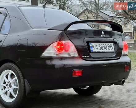 Чорний Міцубісі Lancer, об'ємом двигуна 1.6 л та пробігом 303 тис. км за 4350 $, фото 17 на Automoto.ua