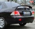 Чорний Міцубісі Lancer, об'ємом двигуна 1.6 л та пробігом 303 тис. км за 4350 $, фото 17 на Automoto.ua