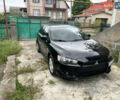 Чорний Міцубісі Lancer, об'ємом двигуна 2 л та пробігом 200 тис. км за 6900 $, фото 1 на Automoto.ua