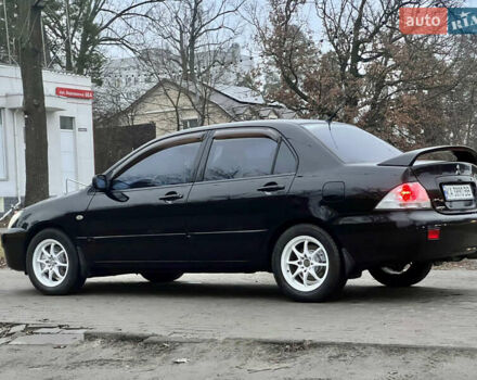 Чорний Міцубісі Lancer, об'ємом двигуна 1.6 л та пробігом 303 тис. км за 4350 $, фото 9 на Automoto.ua