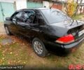 Чорний Міцубісі Lancer, об'ємом двигуна 1.6 л та пробігом 227 тис. км за 4100 $, фото 6 на Automoto.ua