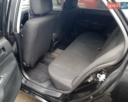 Черный Мицубиси Лансер, объемом двигателя 1.58 л и пробегом 180 тыс. км за 4500 $, фото 1 на Automoto.ua