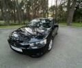 Чорний Міцубісі Lancer, об'ємом двигуна 2 л та пробігом 230 тис. км за 6800 $, фото 1 на Automoto.ua