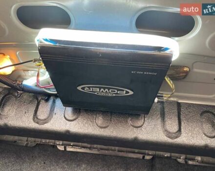 Черный Мицубиси Лансер, объемом двигателя 2 л и пробегом 246 тыс. км за 7500 $, фото 23 на Automoto.ua