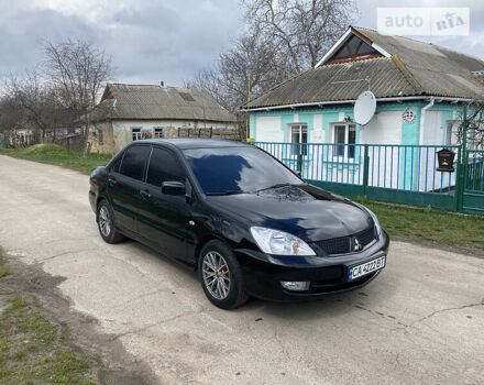 Чорний Міцубісі Lancer, об'ємом двигуна 1.6 л та пробігом 235 тис. км за 4900 $, фото 2 на Automoto.ua