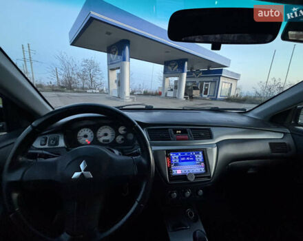 Черный Мицубиси Лансер, объемом двигателя 1.6 л и пробегом 315 тыс. км за 4000 $, фото 6 на Automoto.ua