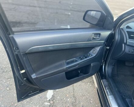 Черный Мицубиси Лансер, объемом двигателя 2 л и пробегом 170 тыс. км за 7900 $, фото 12 на Automoto.ua