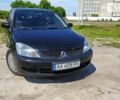 Чорний Міцубісі Lancer, об'ємом двигуна 1.6 л та пробігом 283 тис. км за 3999 $, фото 3 на Automoto.ua